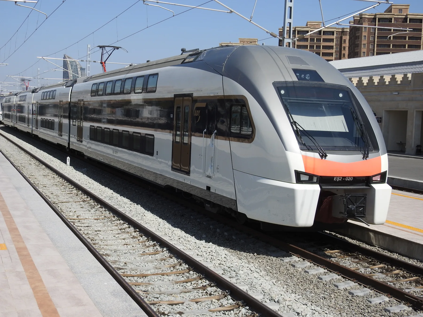 ADY Stadler KISS double-deck train at a station