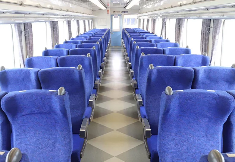 Passenger seating inside Cambodia Royal Railway KiHa train